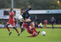 Elliot Lee feels the full force of Joe McNerney`s tackle