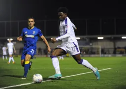 Pelly-Ruddock Mpanzu looks to put a cross into the penalty area
