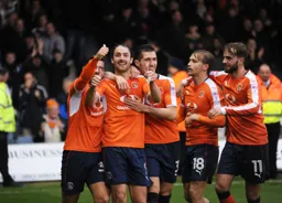 All smiles after Danny Hylton has scored the third goal