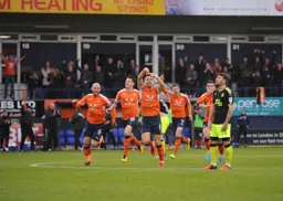 Olly Lee has just scored Town`s second goal from a shot inside his own half