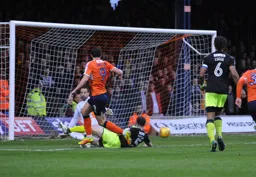 Danny Hylton makes the score 3-0. His first of a hat-trick