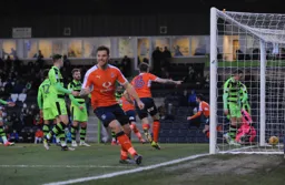 Alan Sheehan (in the background) has just opened the scoring. Johnny Mullins looks pleased about it