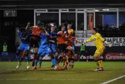 James Collins gets in between defenders to head in the second goal