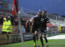 Danny Hylton and James Collins are a pair of happy chaps after Hylton`s goal