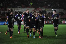 Smiles all around after Elliot Lee had scored the fifth goal