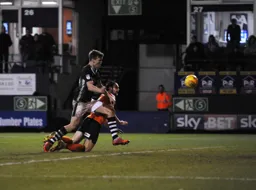 Danny Hylton`s diving header brings a third goal for the Town