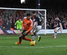 James Justin sends former Hatter Sean Long in the wrong direction