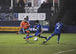 Josh McQuoid`s shot has to get past a forest of legs