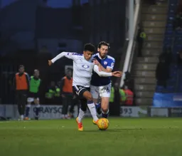 James Justin holds off Jak McCourt