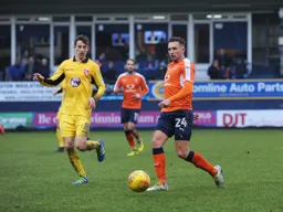 Lawson D`Ath moves forward with the ball