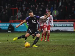 James Collins gives the Town a late lead from the penalty spot