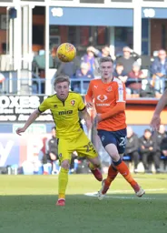 Flynn Downes and future Hatter Joe Morrell keep their eyes on the ball