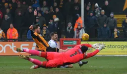 James Collins knocks the ball past David Forde to give Town the lead