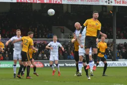 Scott Cuthbert wins an attacking header