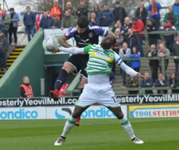 Alan Sheehan climbs all over Francois Zoko