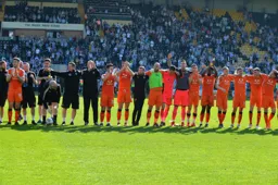 The team thank the travelling fans at the end of a promotion winning season