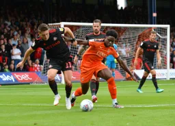 Pelly Mpanzu comes away with the ball