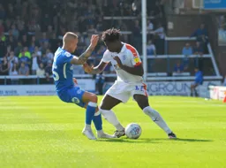 Pelly Mpanzu looking to win the ball