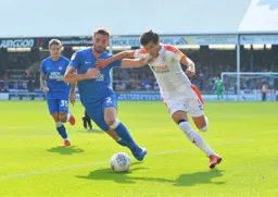 Dan Potts races to get tha ball