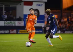 Dan Potts passing the ball