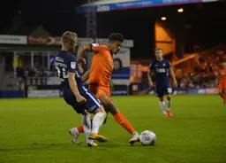 James Justin wins the ball