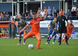 James Collins sees his penalty shot saved