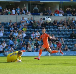 Dan Potts with eyes firmly fixed on the ball