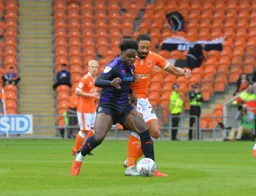 Pelly Mpanzu comes away with the ball