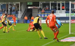 James Justin scores the third