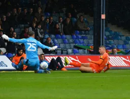 Harry Cornick slides in to score the opening goal