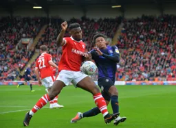 James Justin tries to win the ball