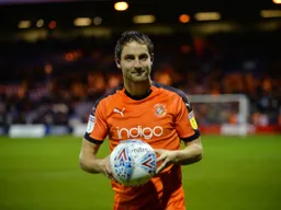 Danny Hylton with the match ball