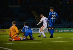 Elliot Lee taps home after Cornick hits the post