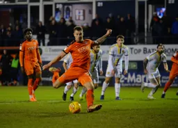 James Collins takes a penalty
