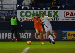 Harry Cornick races to the ball