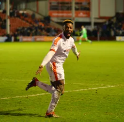 Kazenga LuaLua wheels away in celebration