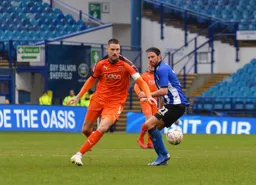 Sonny Bradley brings the ball forward