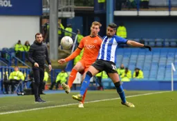 Jack Stacey clears the ball down the line