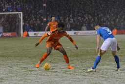 Pelly Ruddock Mpanzu protects the ball