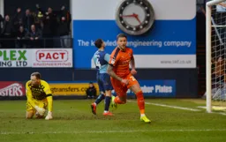 George Moncur puts the balll in the net