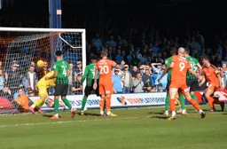 Matty Pearson watches as the ball hits the back of the net