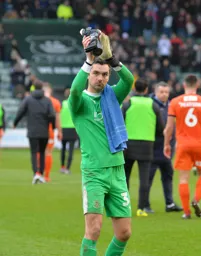 James Shea aplauds the travelling fans