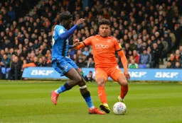 James Justin challenging for the ball