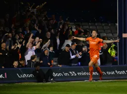 James Collins wheels away in celebration