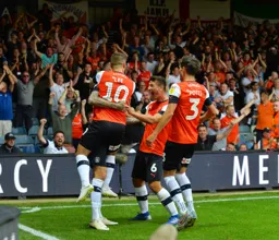Sonny Bradley (obscured) celebrates with Elliot Lee, Matty Pearson and Dan Potts after his spectacular equaliser from outside the box