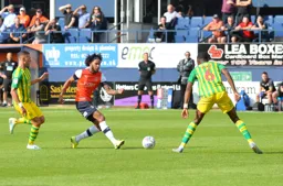 Izzy Brown rampaging forward but about to get stopped by Semi Ajayi