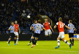 Matty Pearson rises high to meet the cross