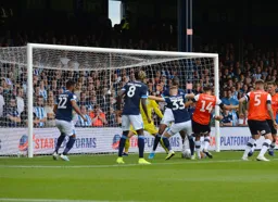 Goalmouth scramble, but Harry Cornick can't find a way through