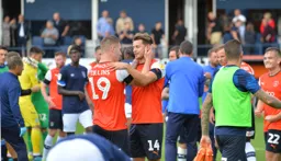 The players celebrate what would turn out to be a vital three points come the end of the season