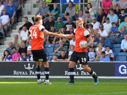 James Collins and Harry Cornick celebrate bringing the game back to 3-2 after trailing 3-0